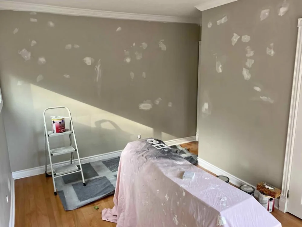 Decorator cutting in a clean line along interior trim