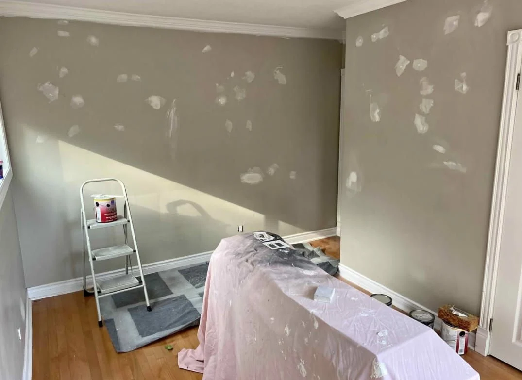 Decorator cutting in a clean line along interior trim