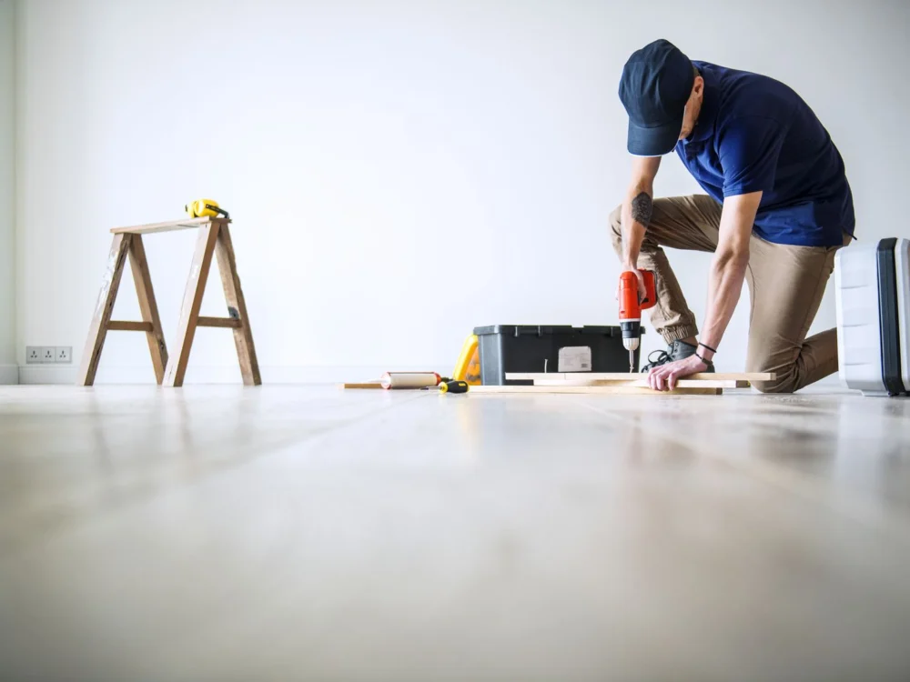 Handyman working through a list of small household repairs